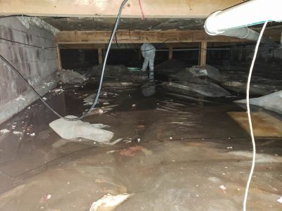 Local Crawl Space Waterproofing pros at work